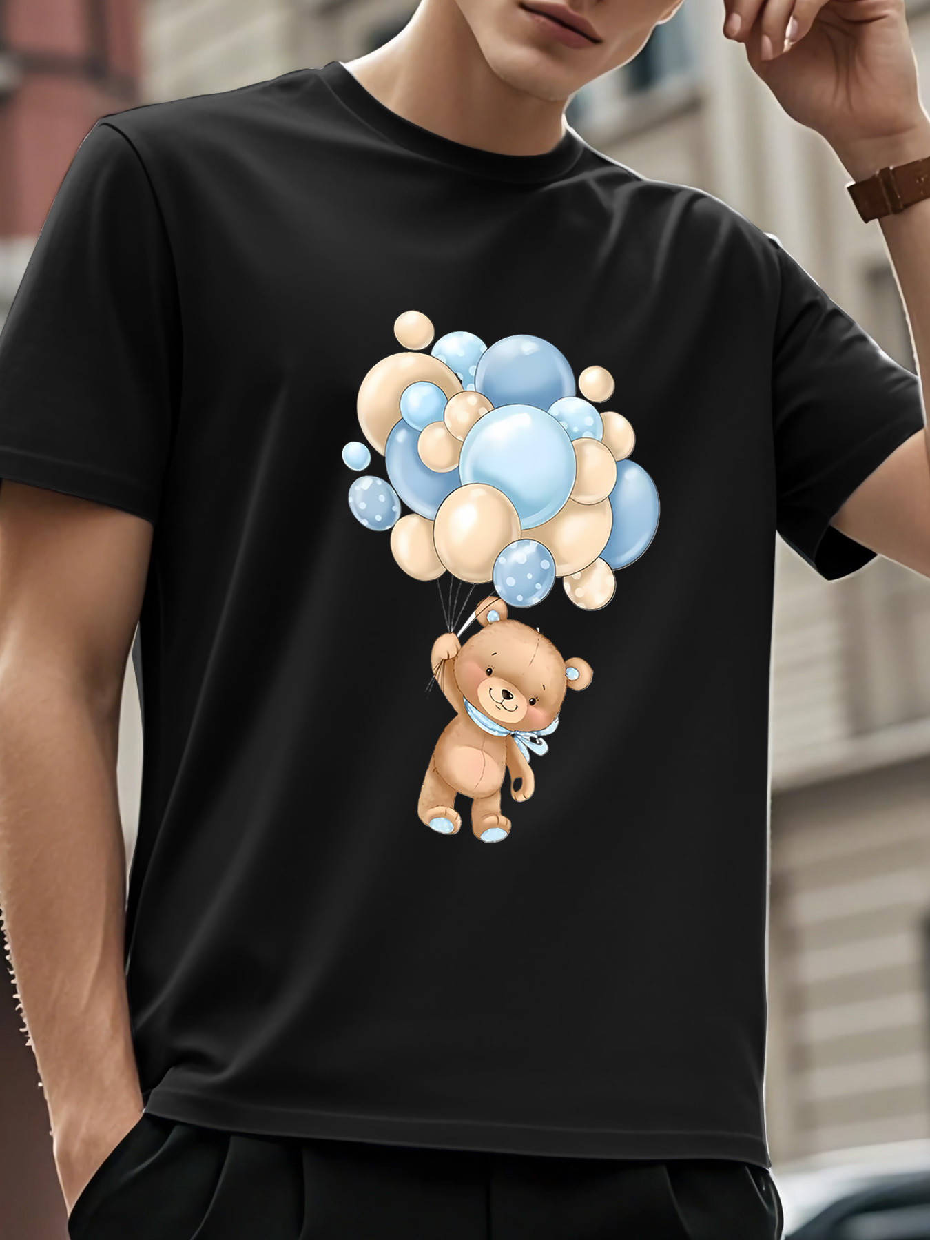Men's Graphic T-Shirt Playful Brown Bear Lifting Pastel Balloons Floating Under Clear Blue Sky Bear