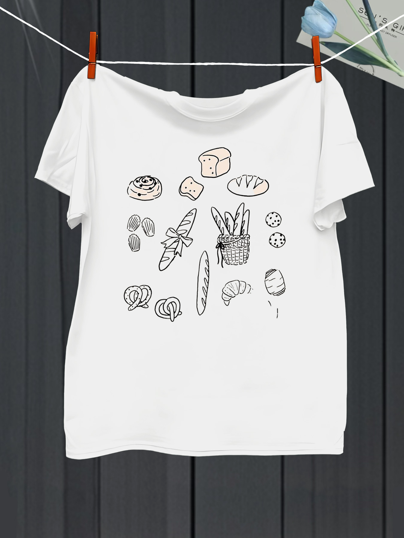 Men's Graphic T-Shirt Hand Drawn Fresh Baked Breads Croissants And Loaves Under Sunlight Basket