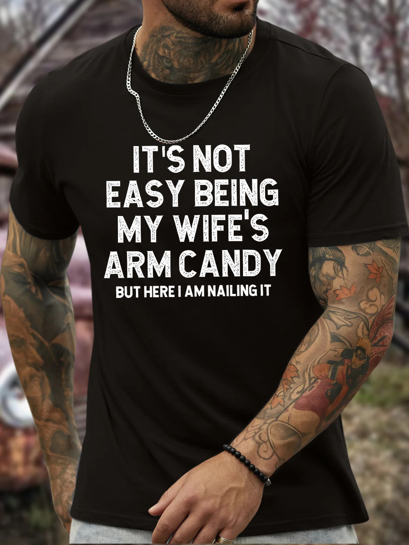Men's Graphic T-Shirt Its Not Easy Being My Wifes Arm Candy Here I Am Nailing It Bold White Lettering On Solid Black Cotton Shirt