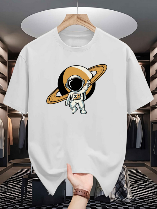 Men's Graphic T-Shirt Floating Astronaut With Golden Ringed Planet Illustration