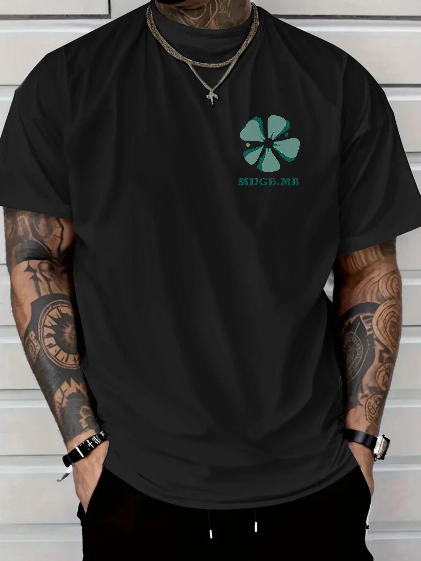 Men's Graphic T-Shirt Green Clover Emblem Under Soft Light On Casual Tee