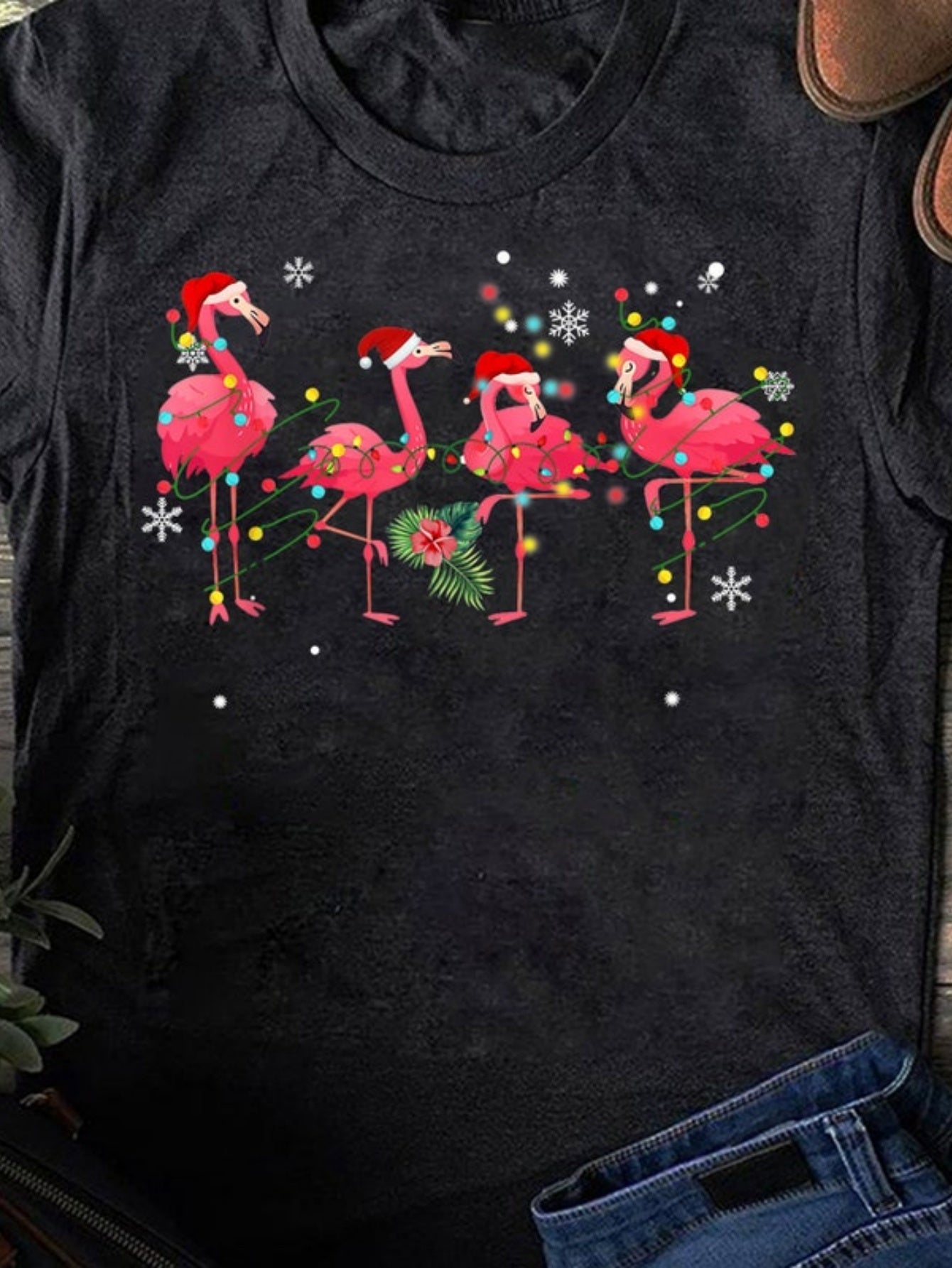 Men's Graphic T-Shirt Cheerful Festive Lights And Santa Hats On Playful Flamingo