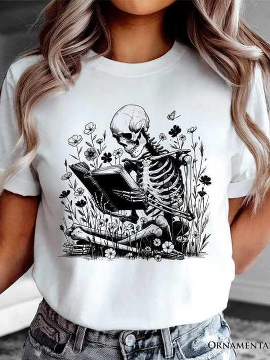 Women's Graphic T-Shirt Vintage Skeleton Reading Among Wildflowers And Butterflies In Garden