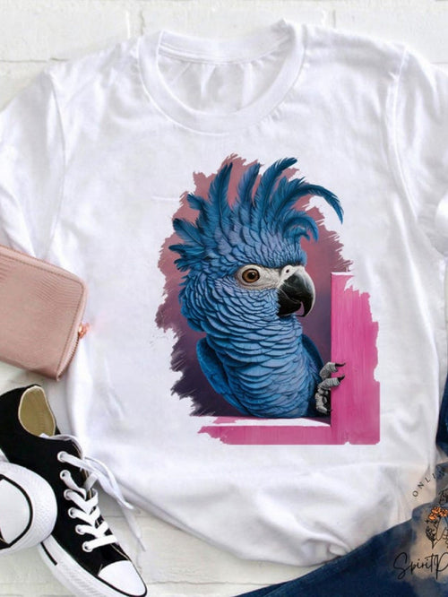 Men's Graphic T-Shirt Bright Blue Feathers On Vibrant Pink Painted Background Parrot
