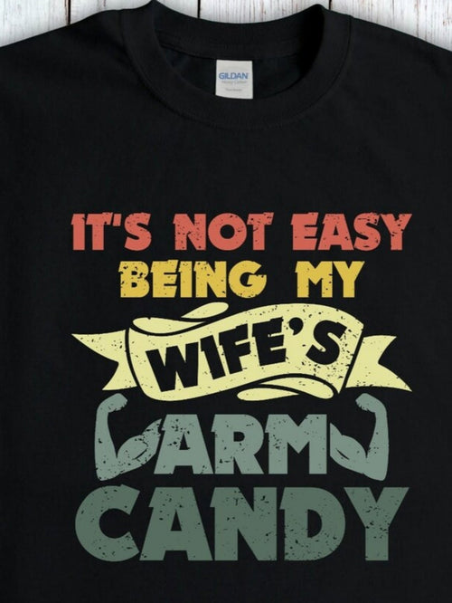 Men's Graphic T-Shirt Its Not Easy Being My Wifes Arm Candy Colorful Bold Typography With Banner And Flexed Arms