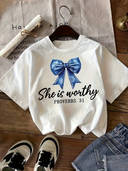 Men's Graphic T-Shirt She Is Worthy With Shimmering Blue Bow Under Soft Light