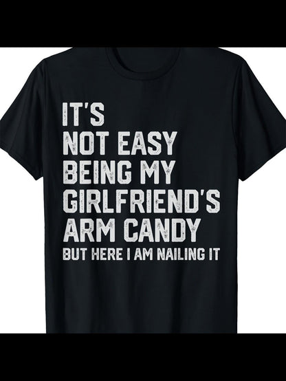 Men's Graphic T-Shirt Its Not Easy Being My Girlfriends Arm Candy Nailing It Bold Slogan Statement White Letters Black Shirt
